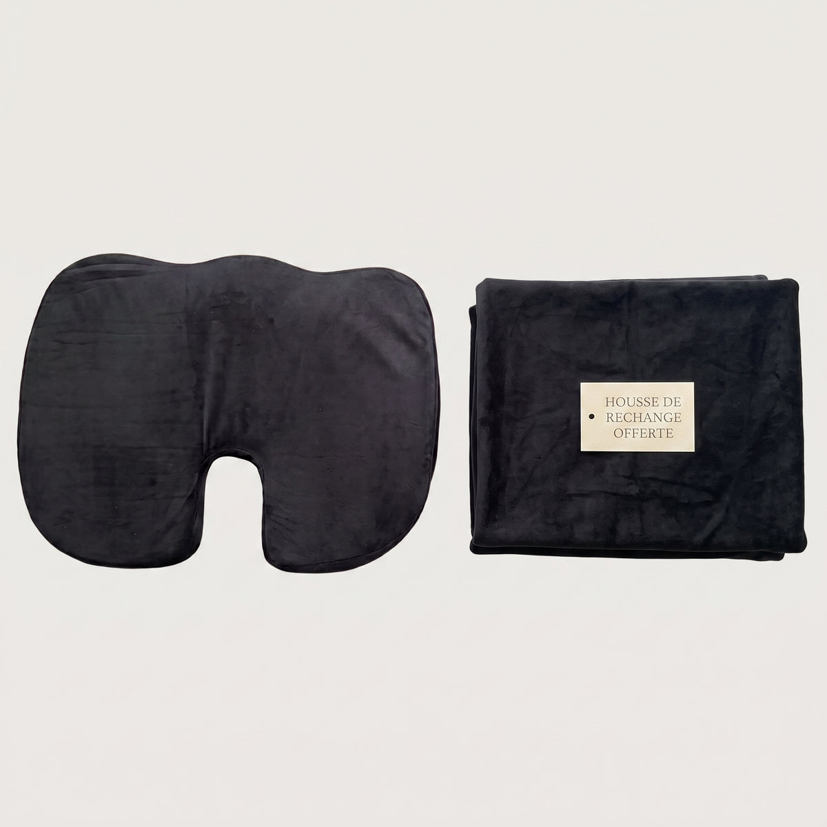 Coussin coccyx et sa housse de rechange pliée à côté Image